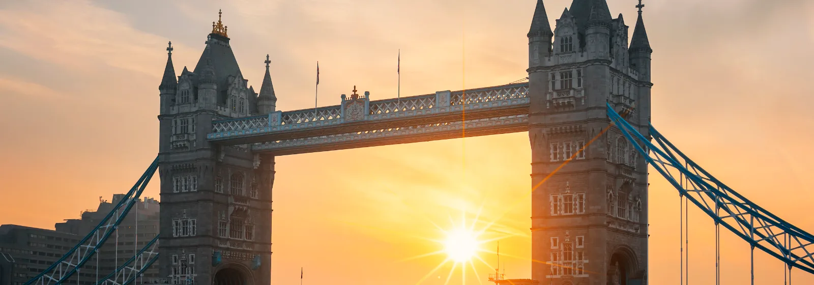 Tower Bridge over the River Thames in London at sunrise